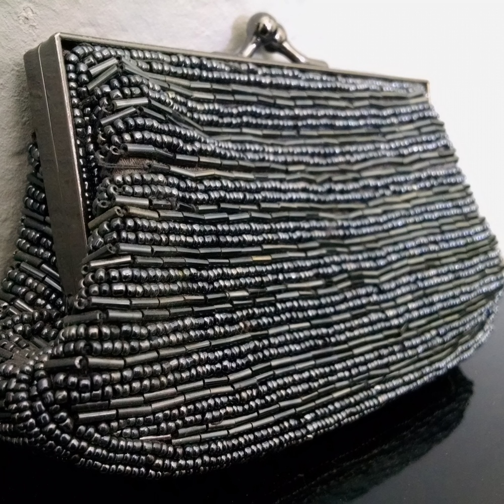 Sequence handbag with long chain strap